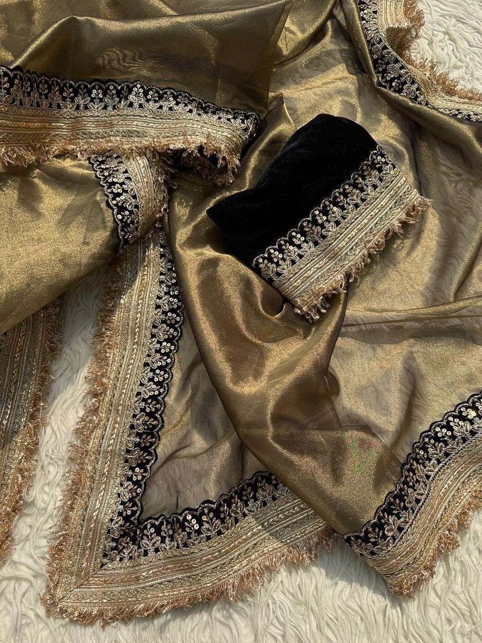 Glamorous Antique Gold Tissue Saree with Black Embroidered Border