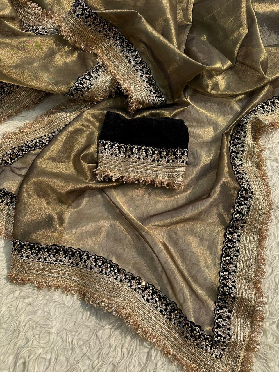 Glamorous Antique Gold Tissue Saree with Black Embroidered Border