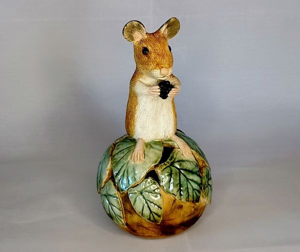 Woodmouse on leaf globe