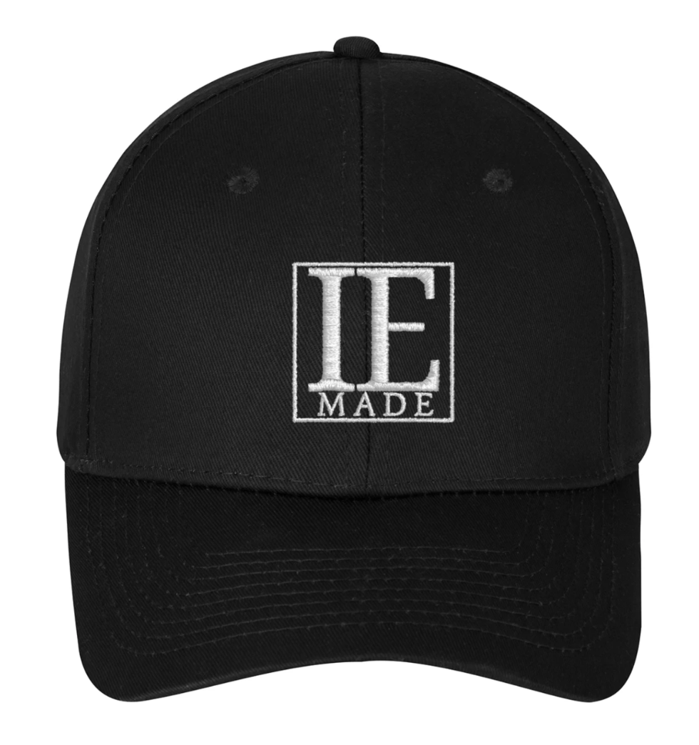 Black cap, white embroidery
