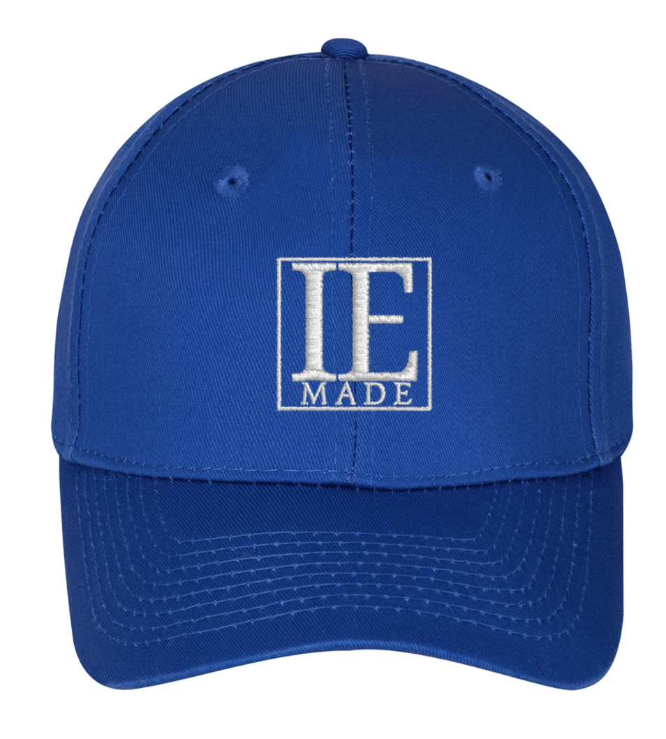 Blue hat, white embroidery