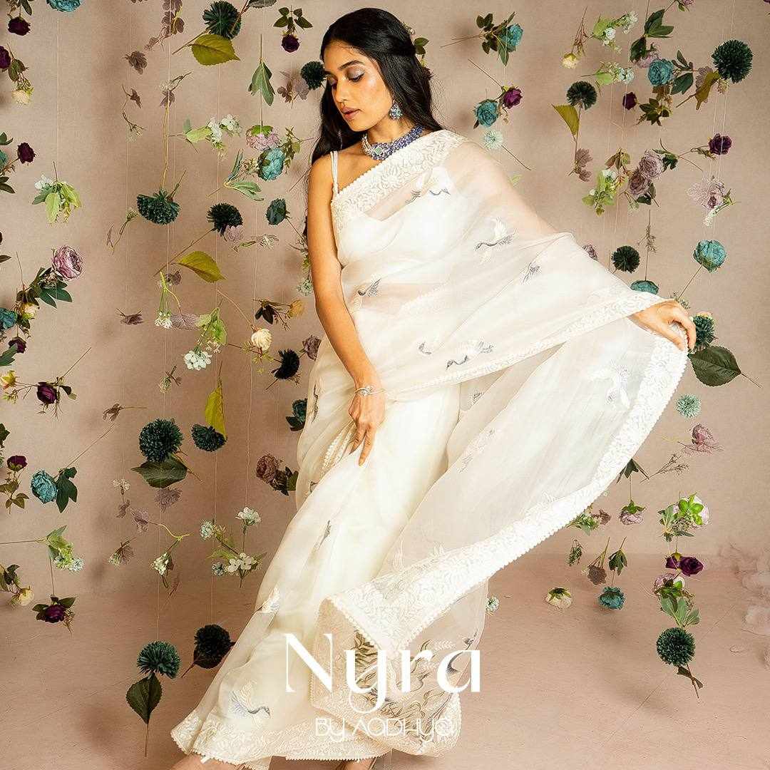 Elegant White Embroidered Saree