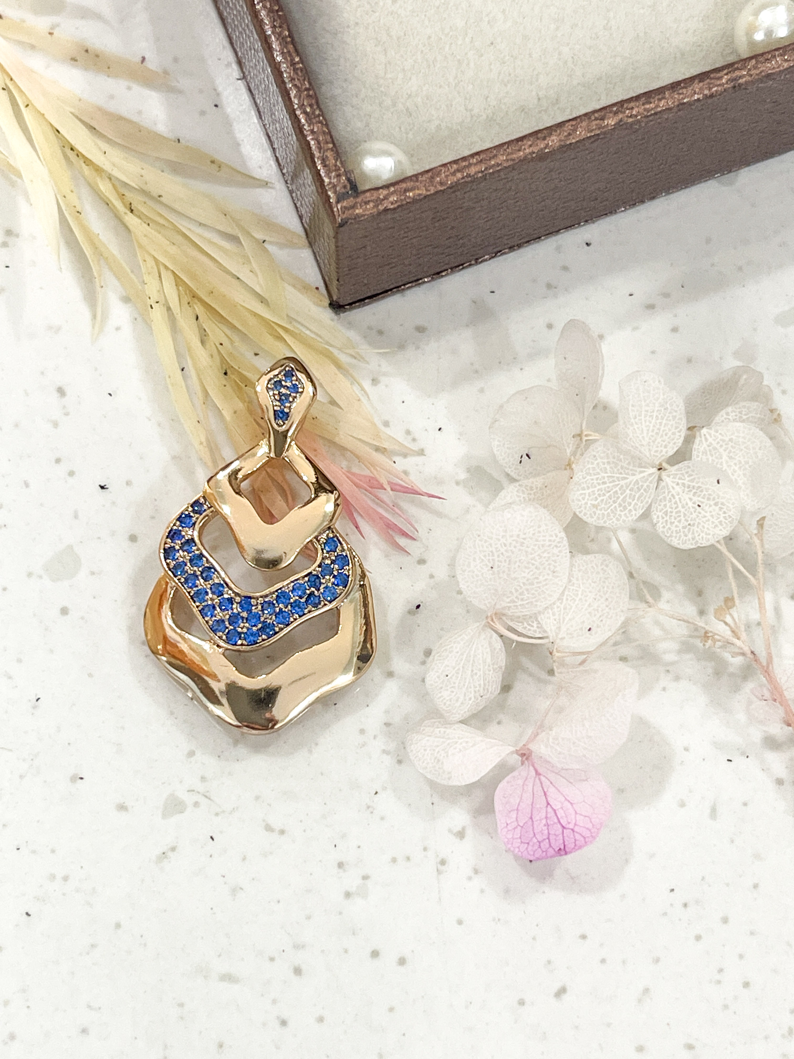 Gold Pendant with Blue Gemstones
