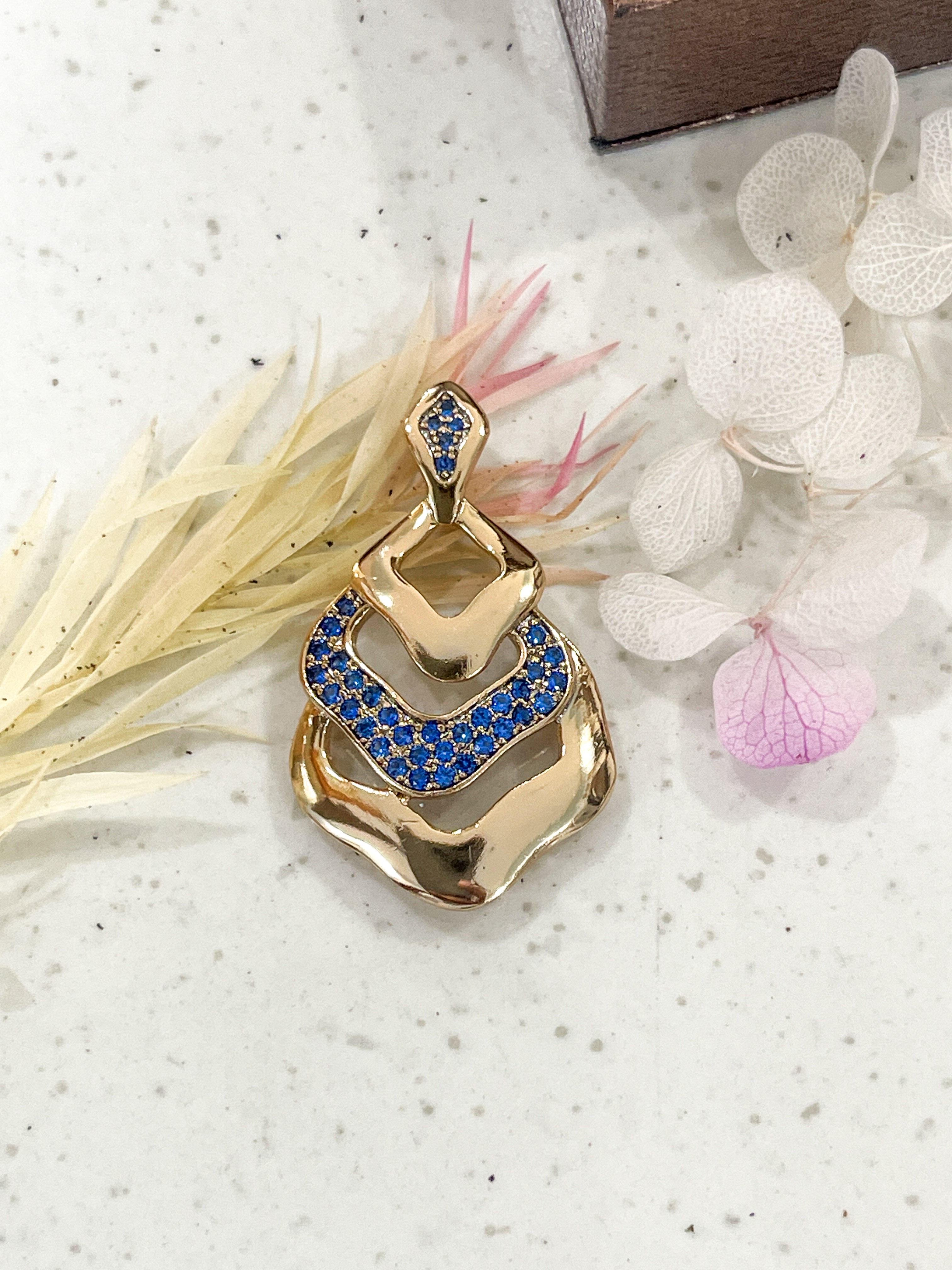 Gold Pendant with Blue Gemstones