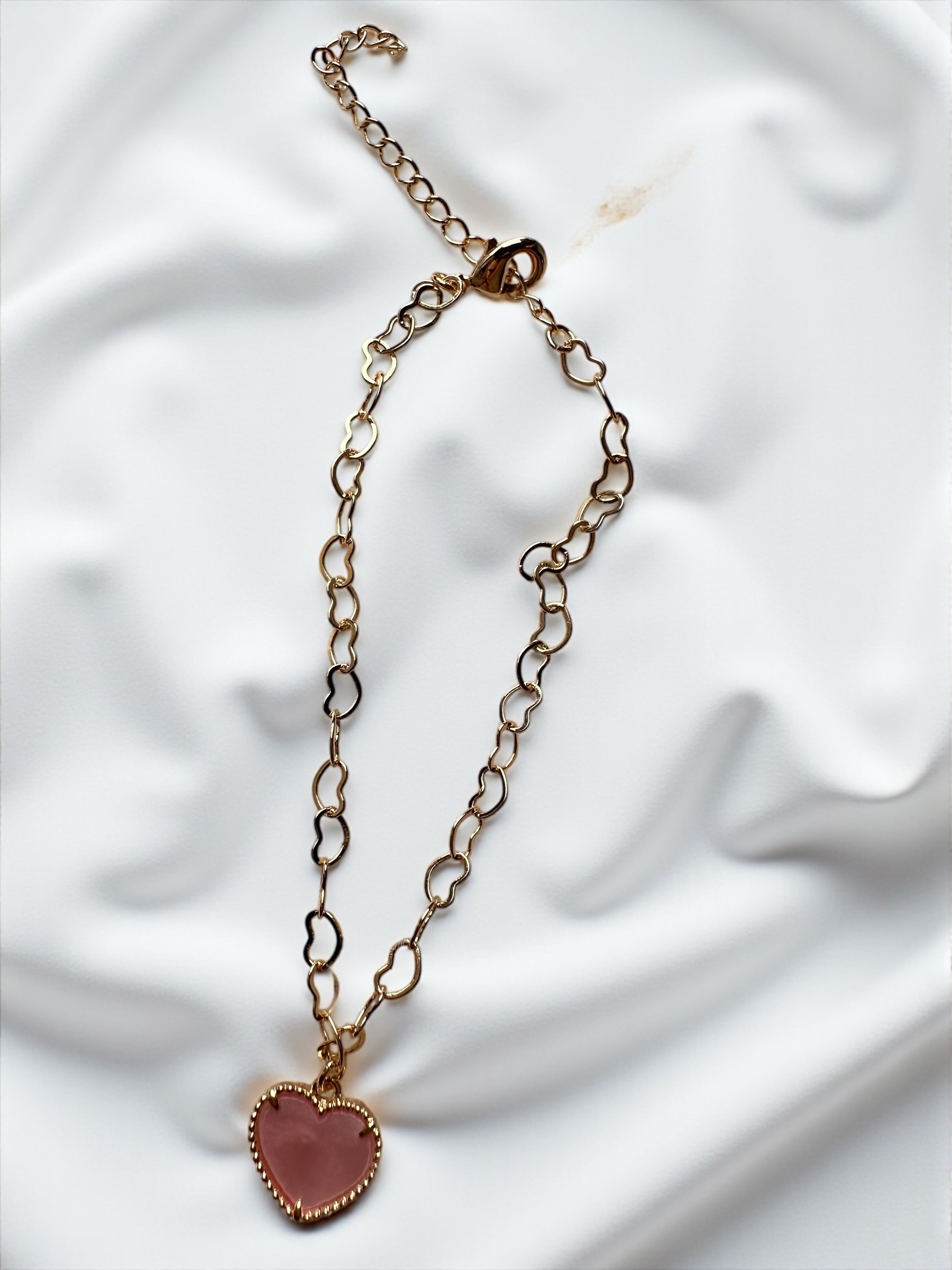 Pulseira com pingente de coração