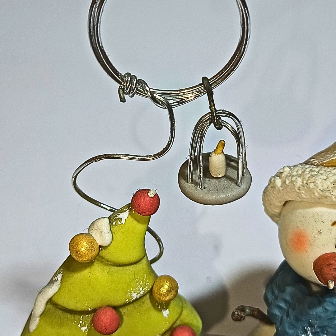 Portaretrato artesanal de muñeco de nieve y árbol de Navidad