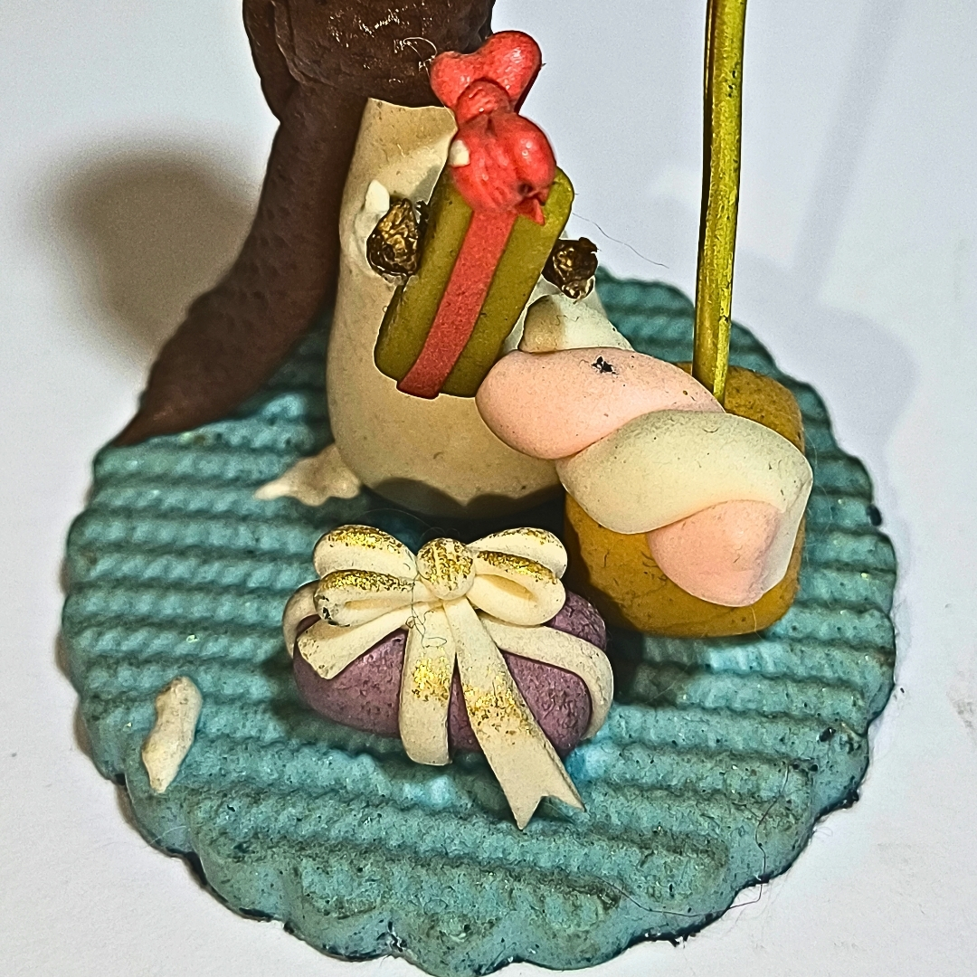 Portafoto artesanal Muñeco de Nieve con regalos