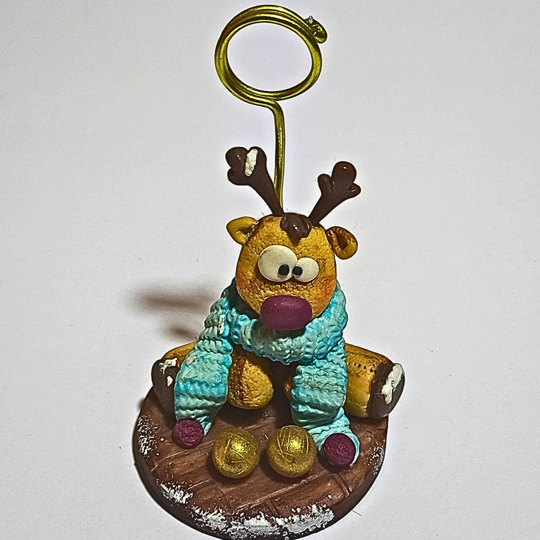 Portafoto artesanal Reno con bufanda azul