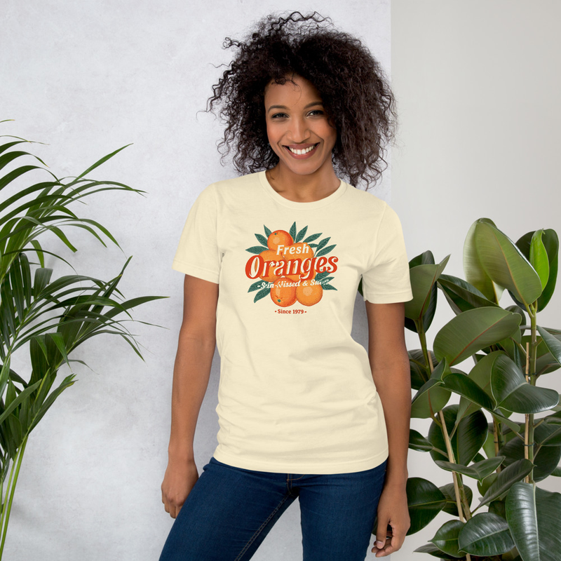 “Fresh Oranges – Sun-Kissed & Sweet” with retro typography and hand-painted oranges Unisex t-shirt