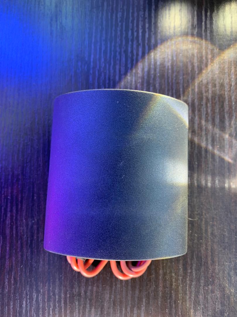 Black cylindrical electronic component