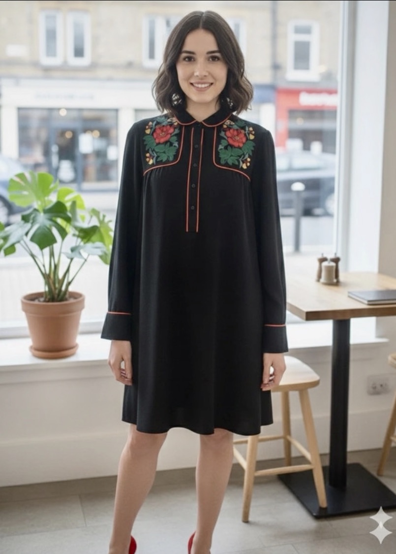 Vestido negro con bordados florales