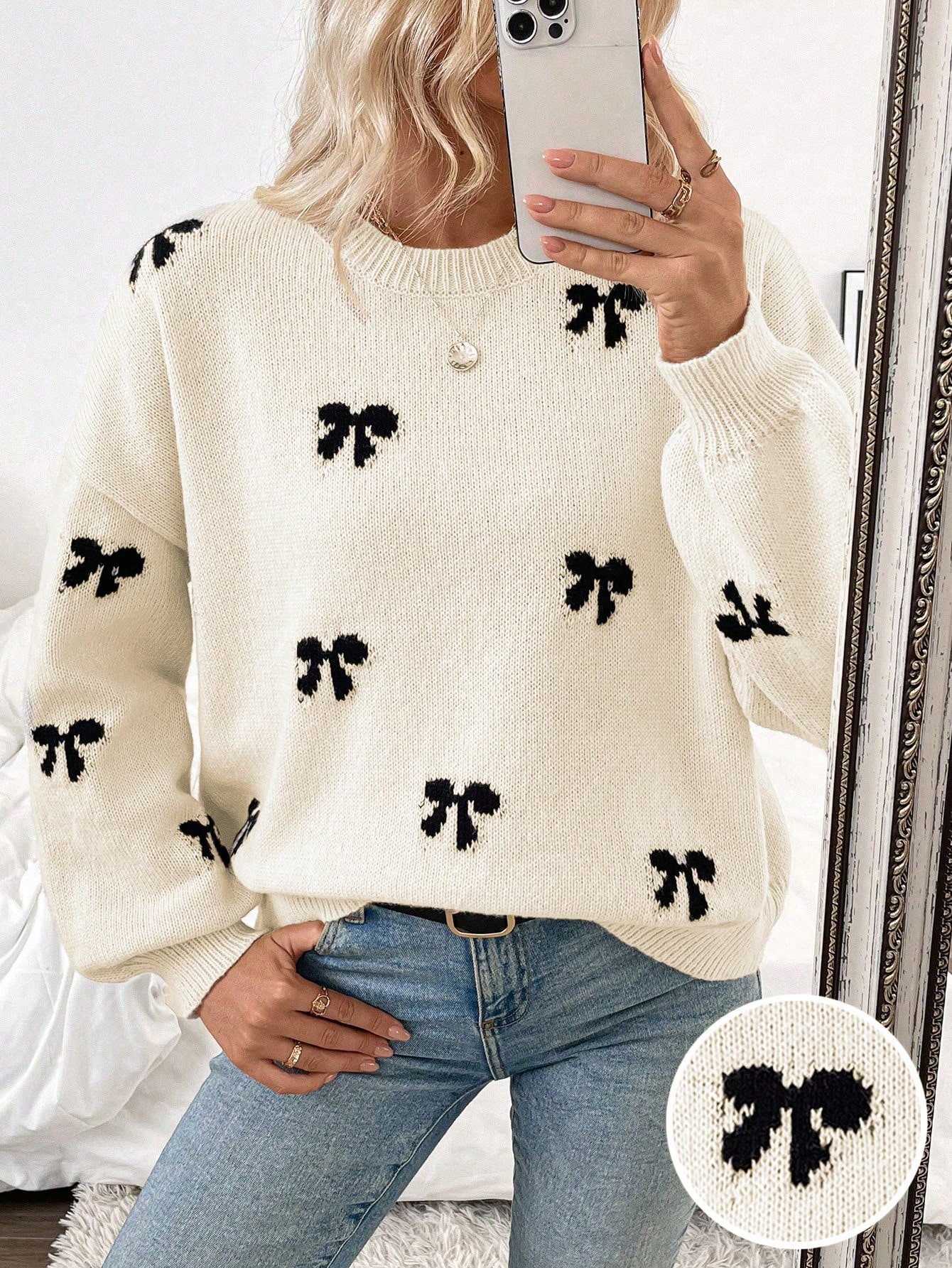 White Sweater with Black Bow Pattern
