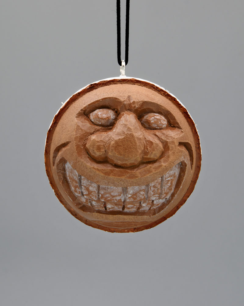 Tiki Guy Carved Golf Ball Art