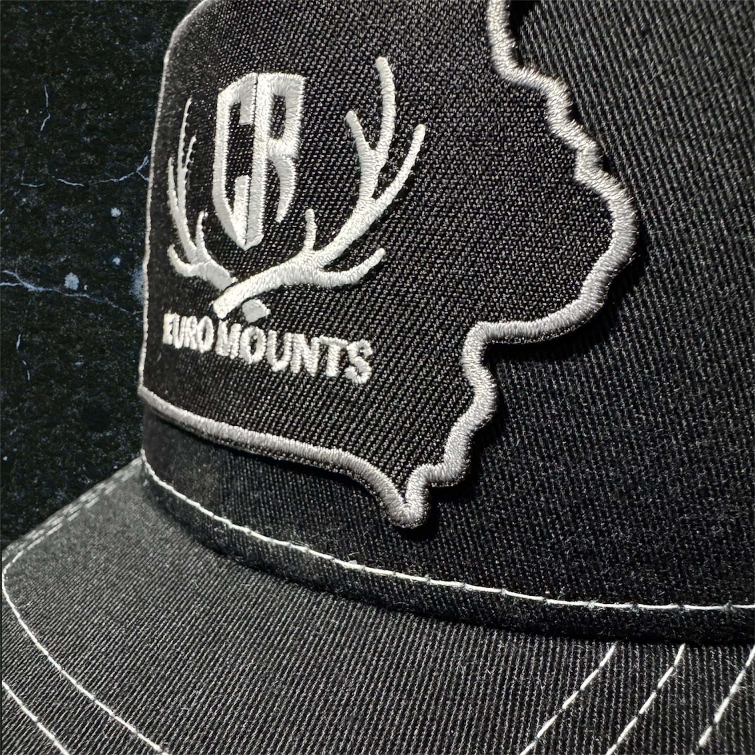 CR Euro Mounts Black Snapback Trucker Hat with Embroidered Fabric Patch
