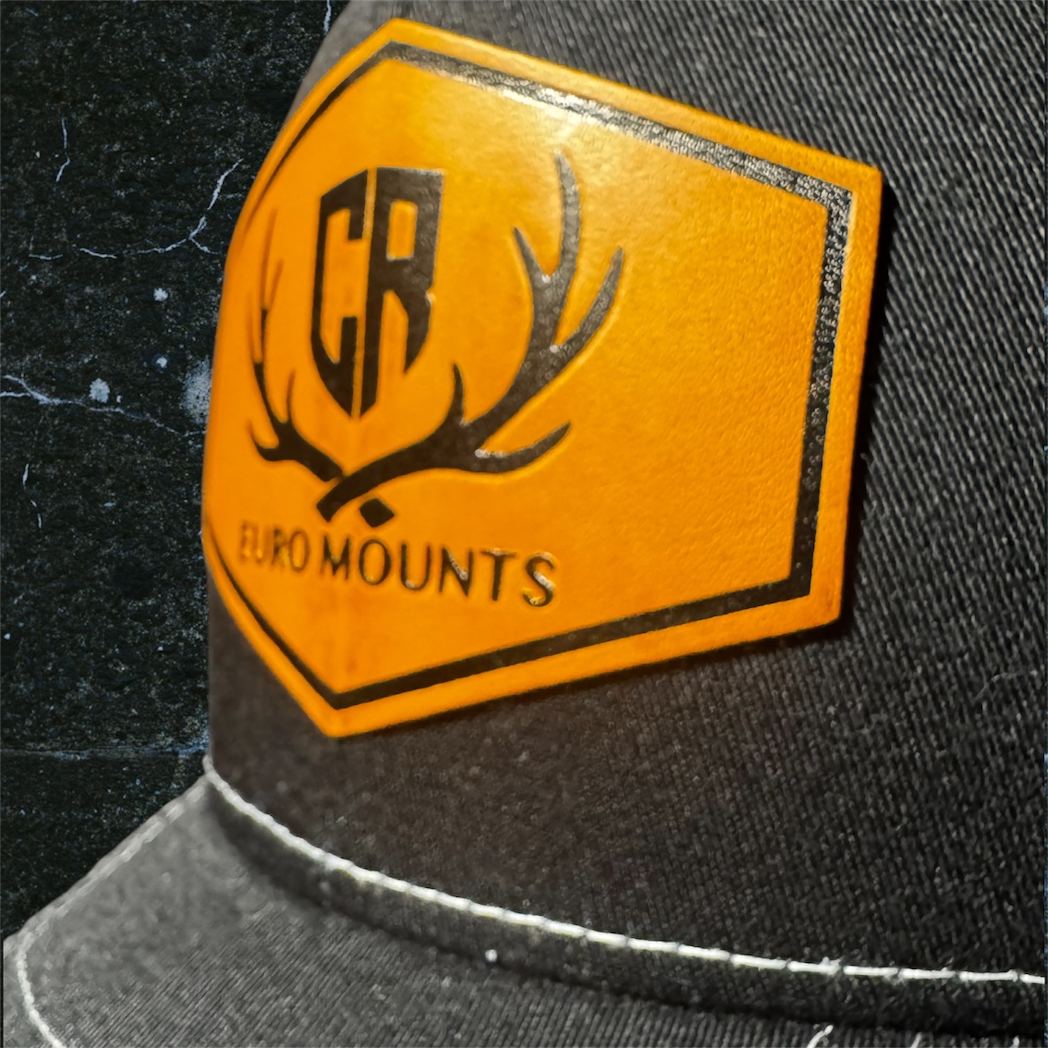 CR Euro Mounts Black Snapback Trucker Hat with Leather Logo