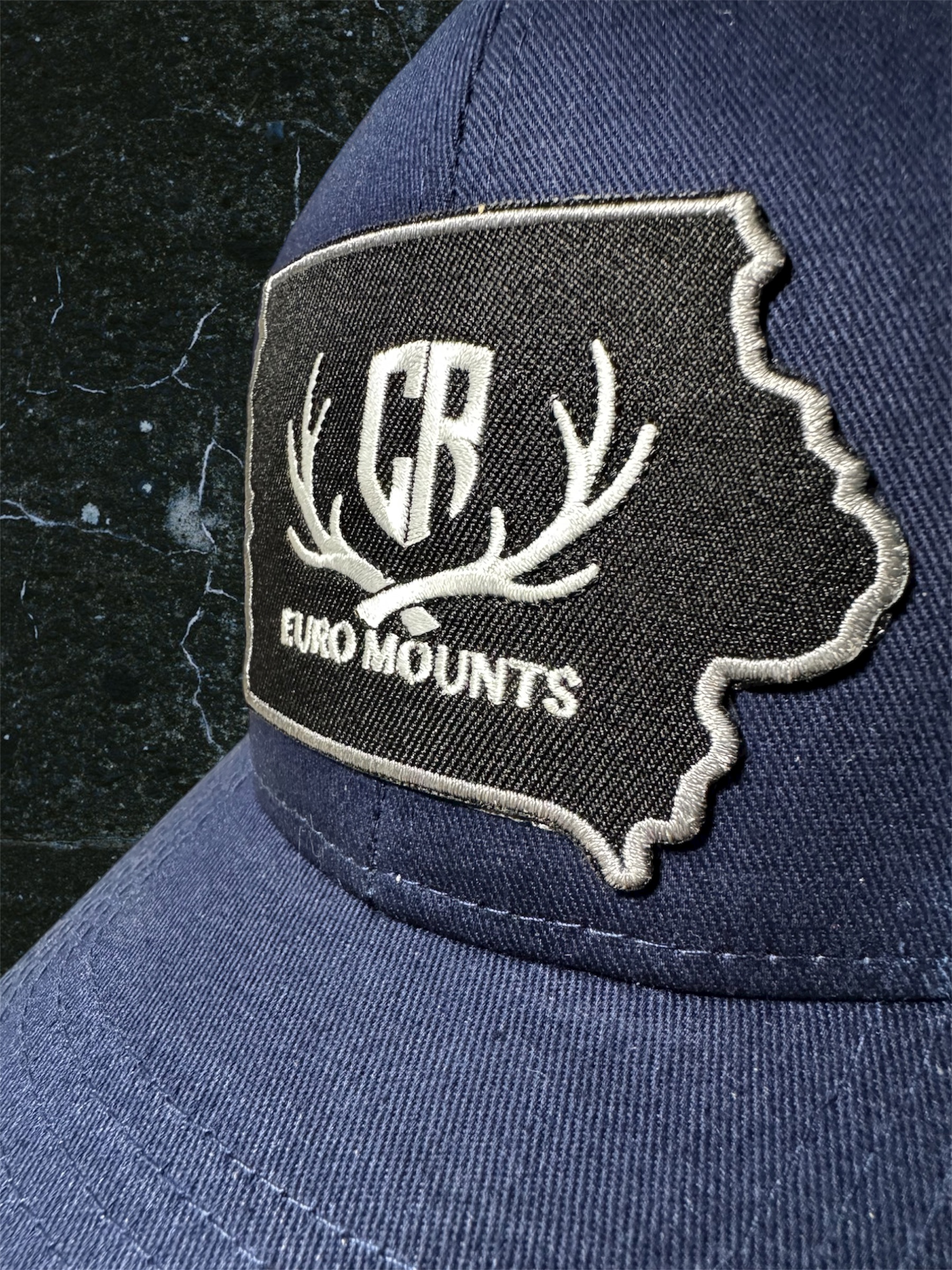 CR Euro Mounts Blue Snapback Trucker Hat with Embroidered Fabric Patch