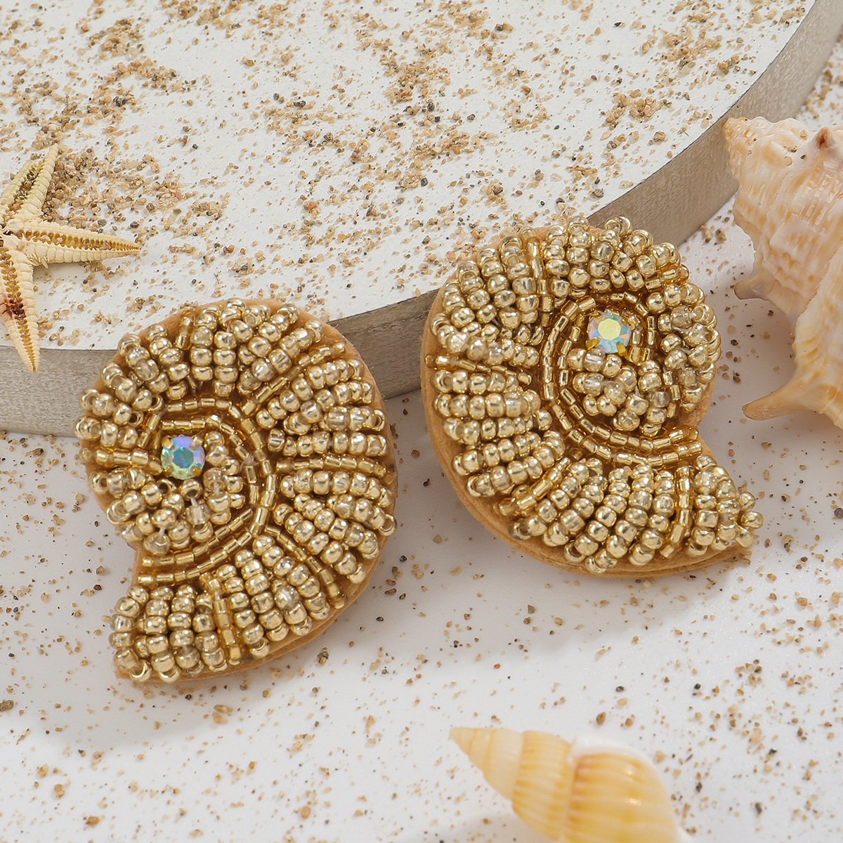Beaded Nautilus Shell Brooches