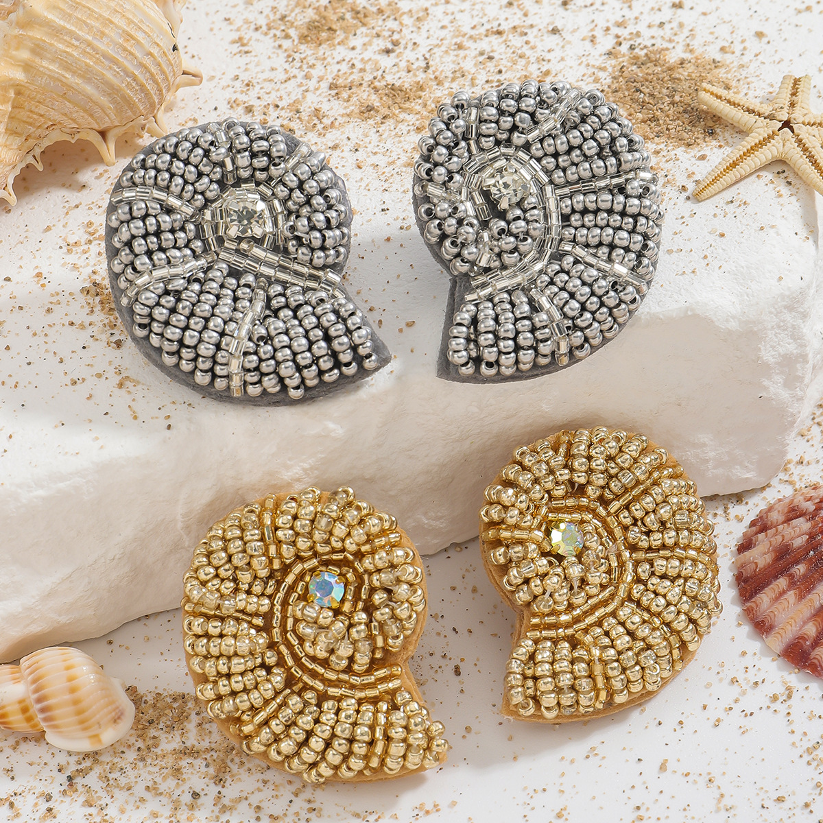 Beaded Nautilus Shell Brooches