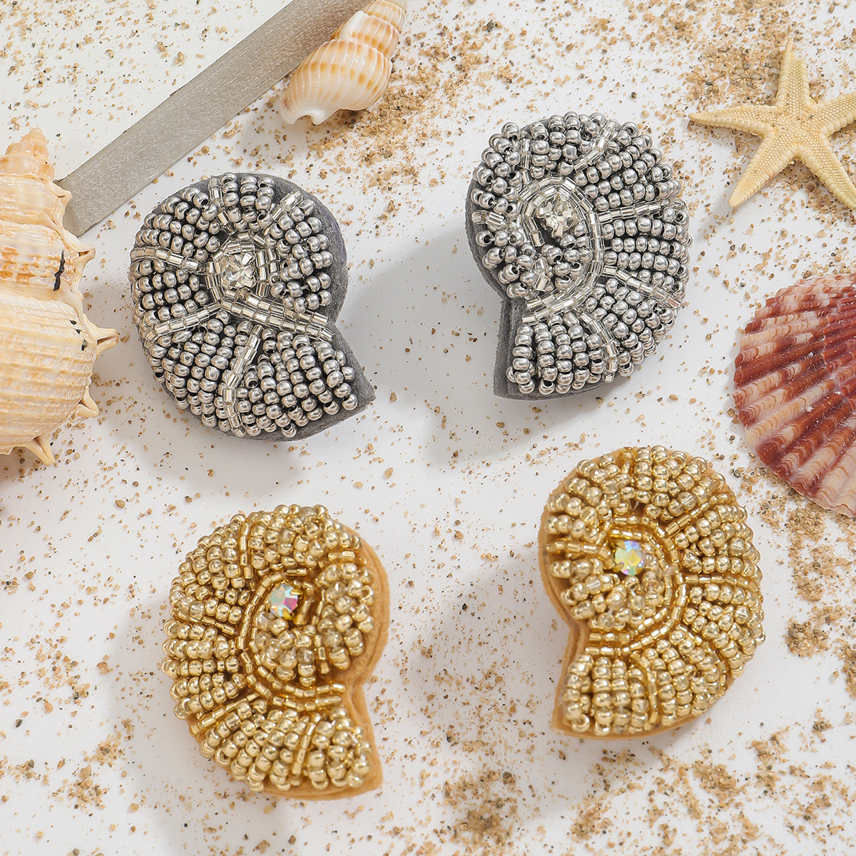 Beaded Nautilus Shell Brooches