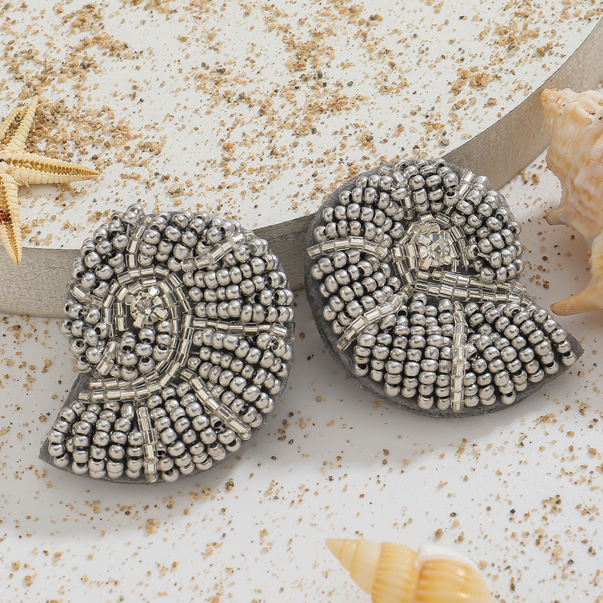 Beaded Nautilus Shell Brooches