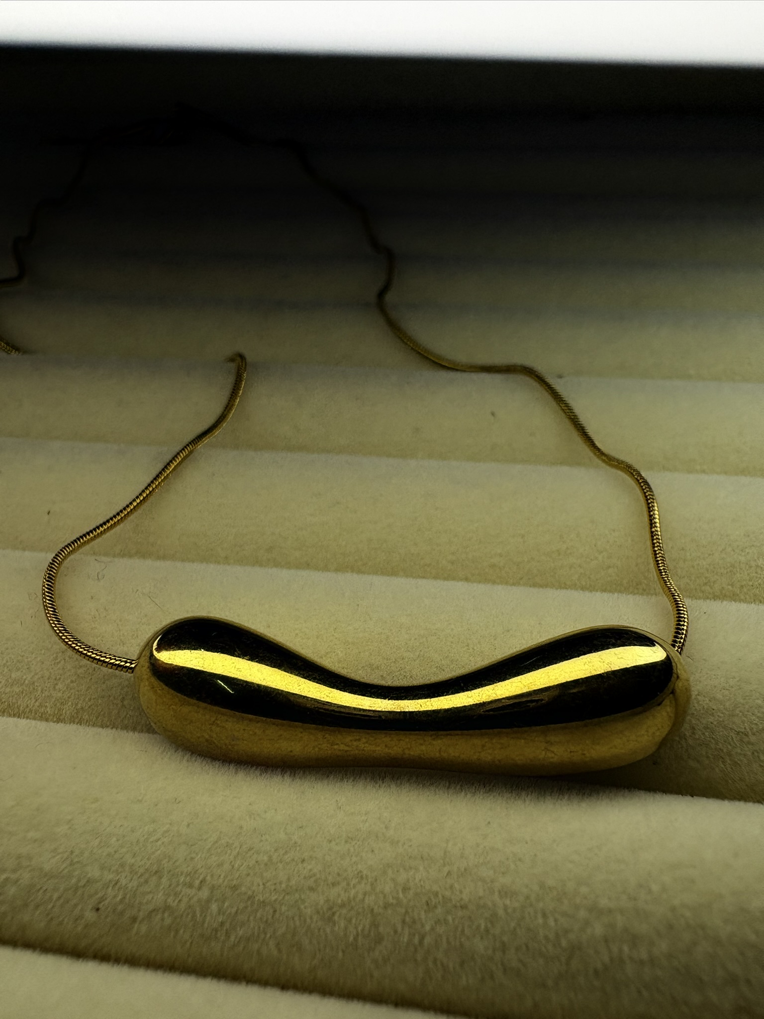 Gold Wave Pendant Necklace