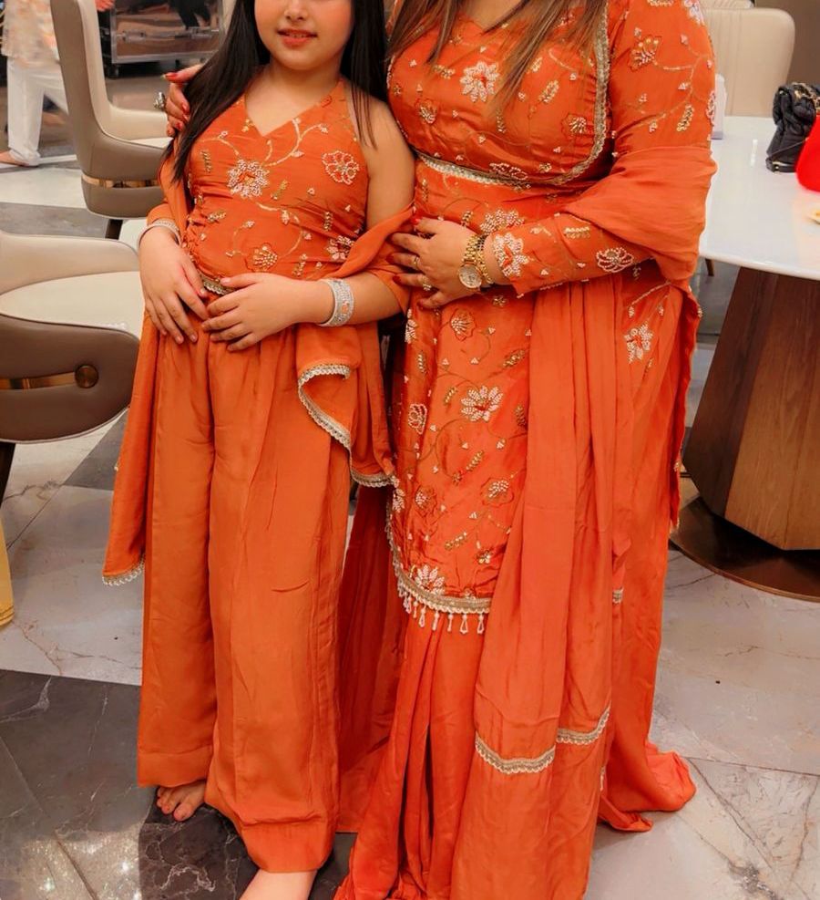 Matching Orange Traditional Outfits