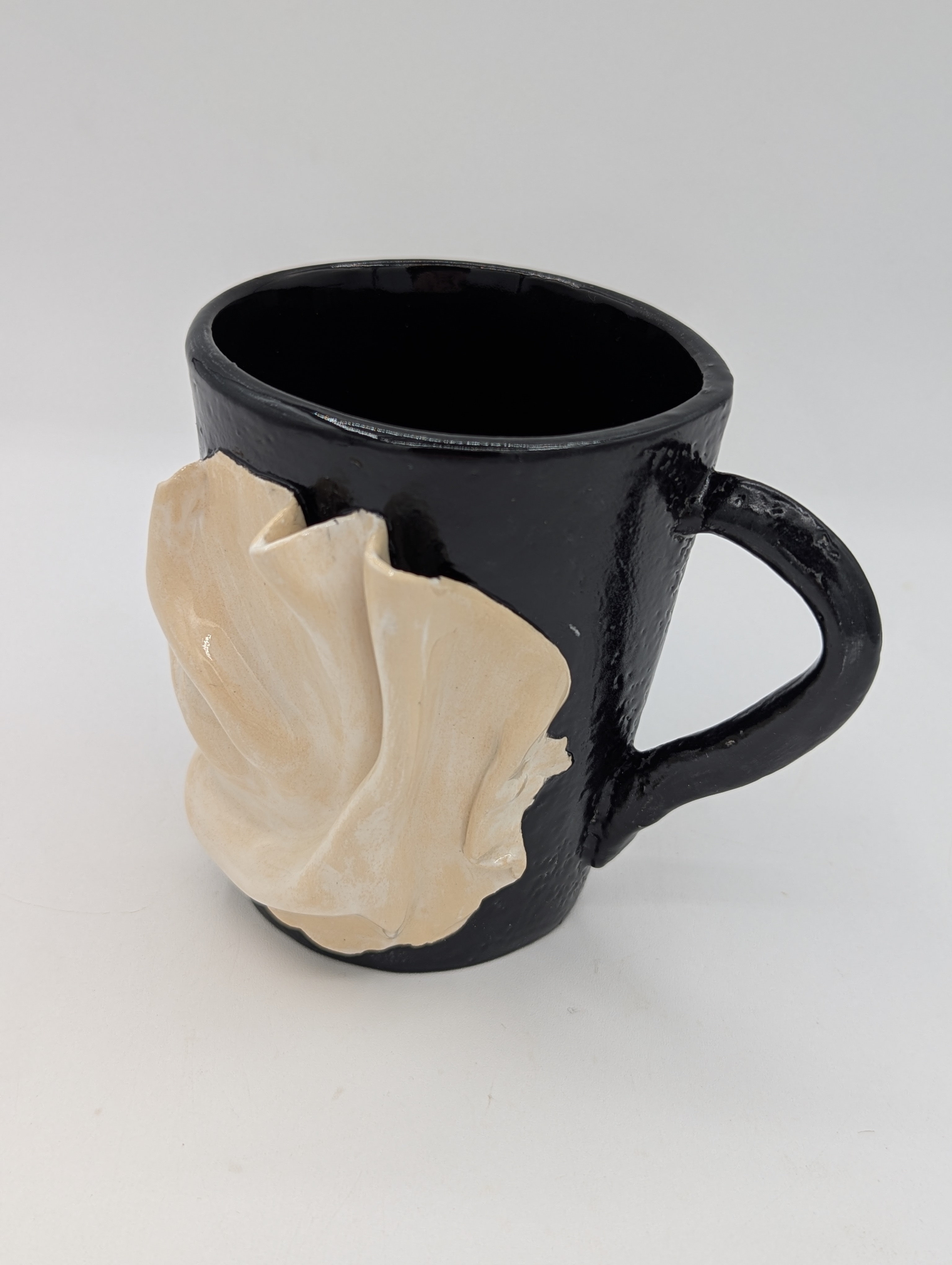 Black drapery mug