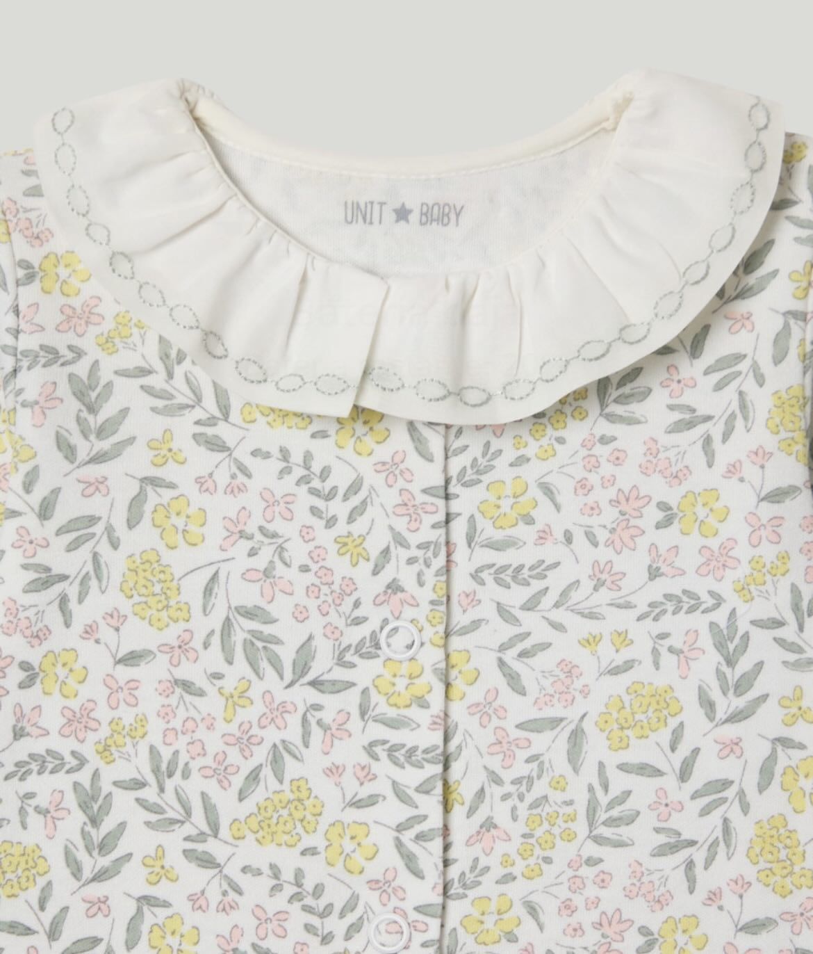 mameluco con cuello y flores amarillas 12m