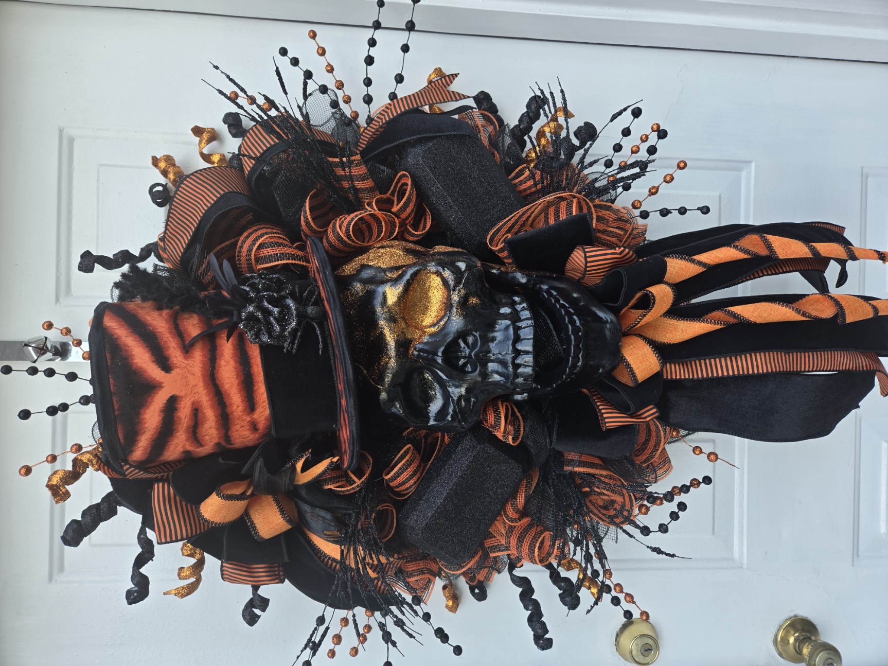 "Halloween Sophistication" – Gothic Black & Orange Skull Wreath