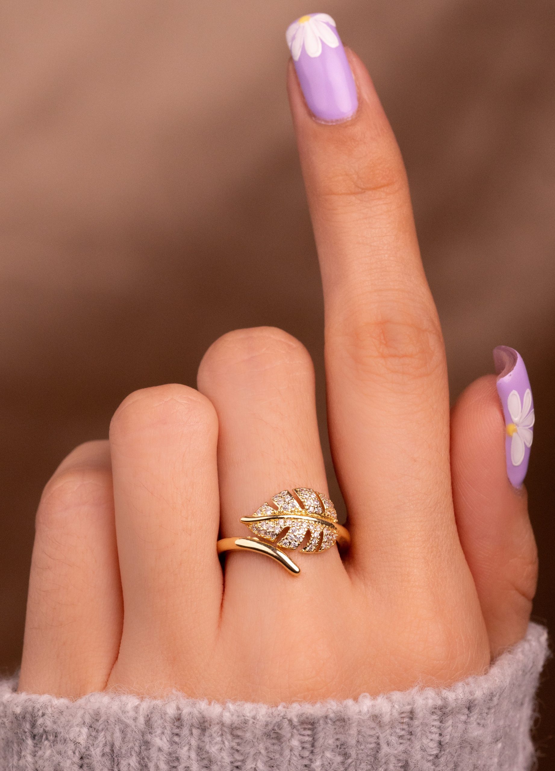 ANILLO HOJA CIRCONES DORADO
