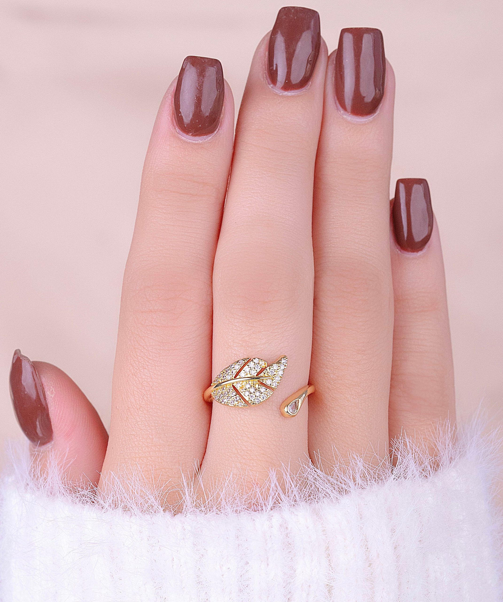 ANILLO HOJA CIRCONES DORADO 