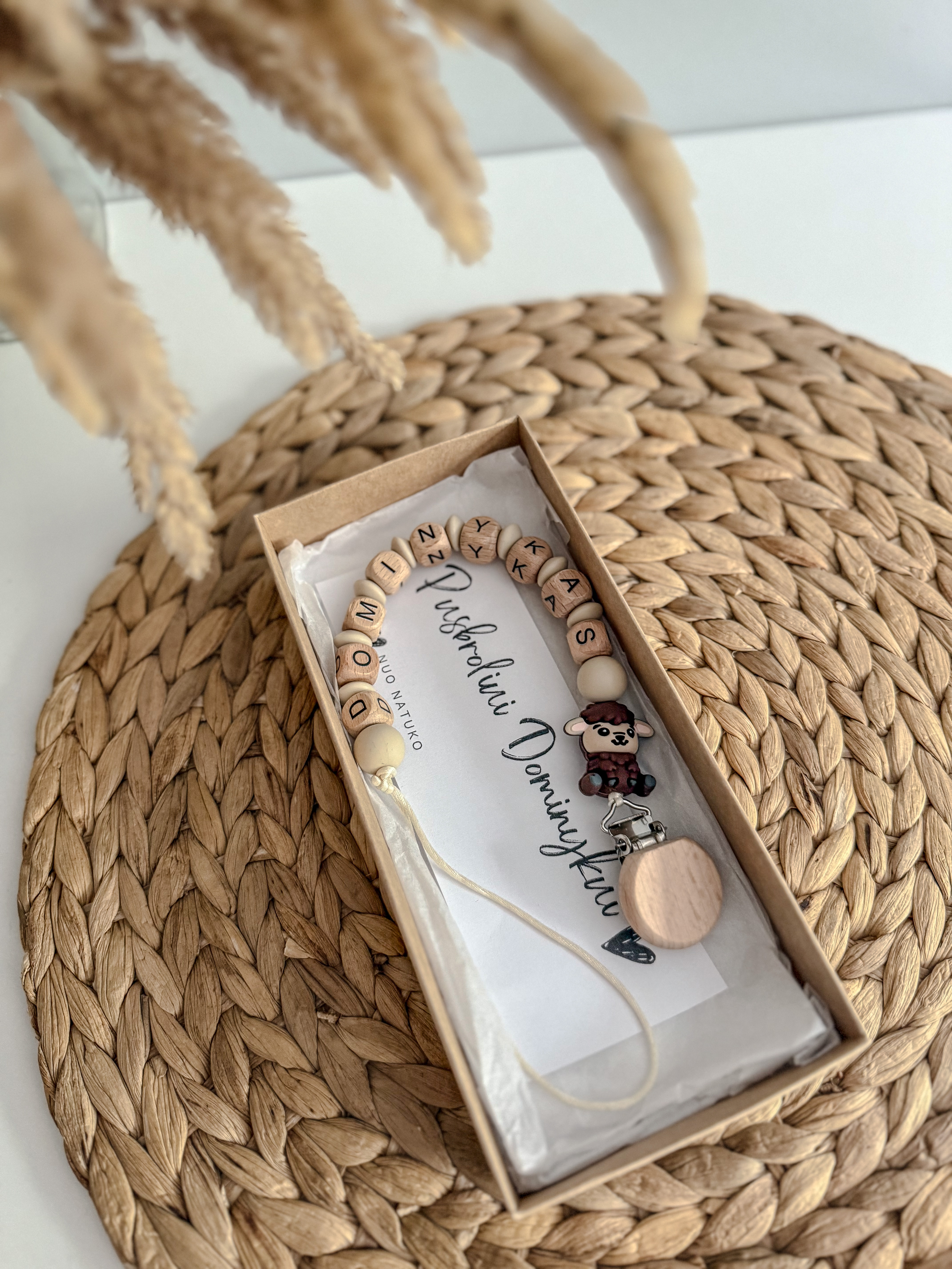 Čiulptuko laikiklis su vardu