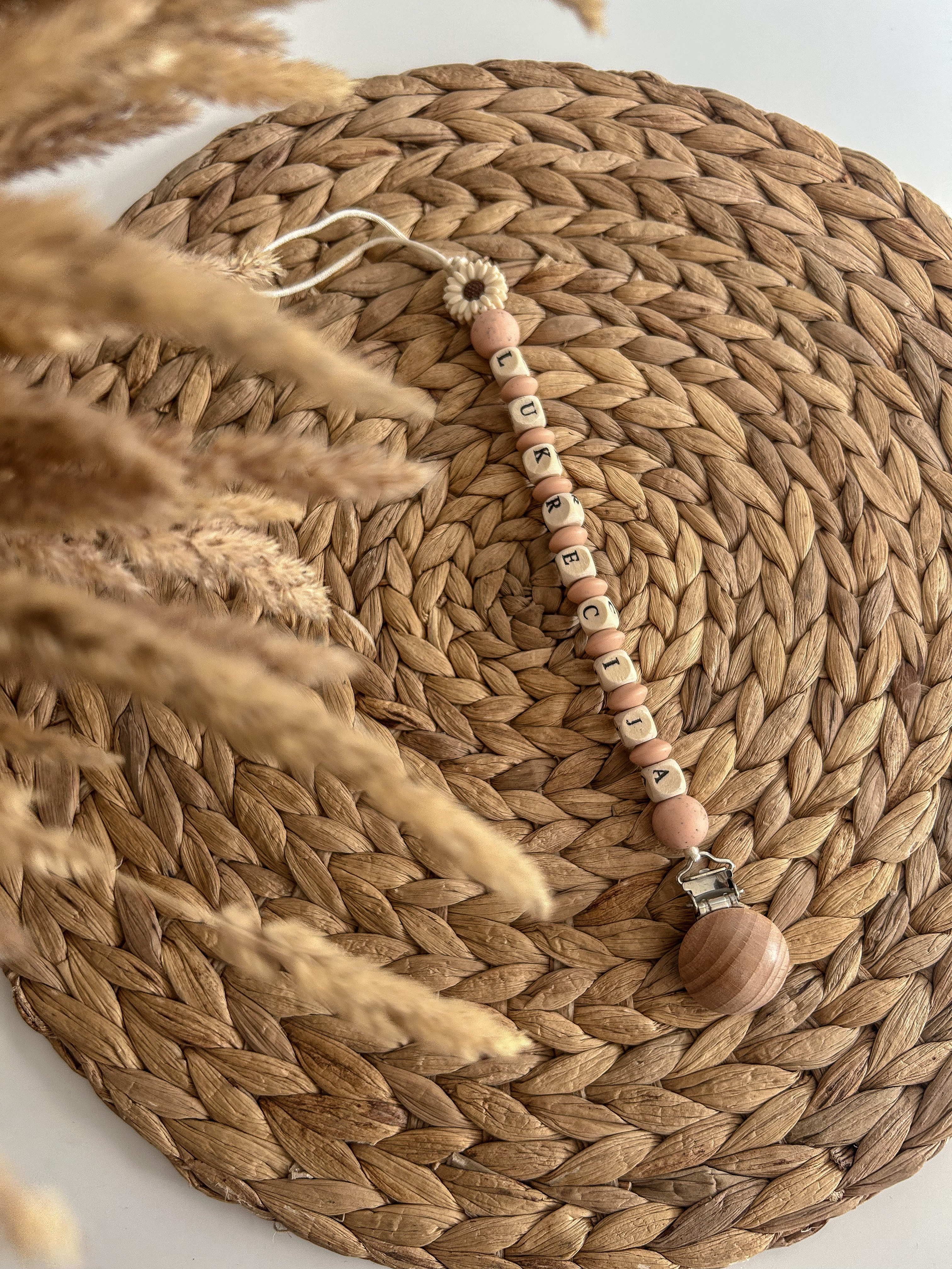 Čiulptuko laikiklis su vardu