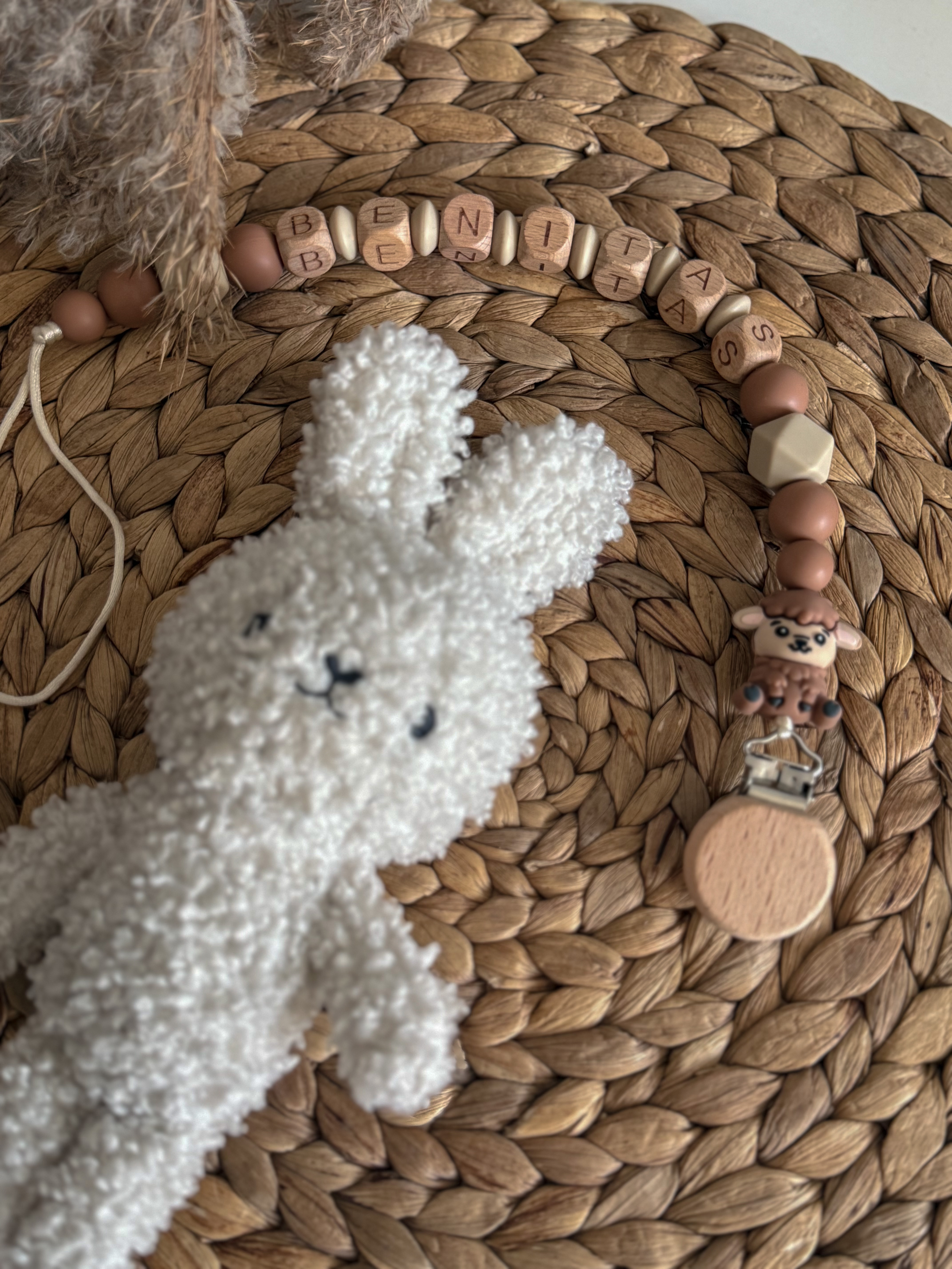 Čiulptuko laikiklis su vardu 