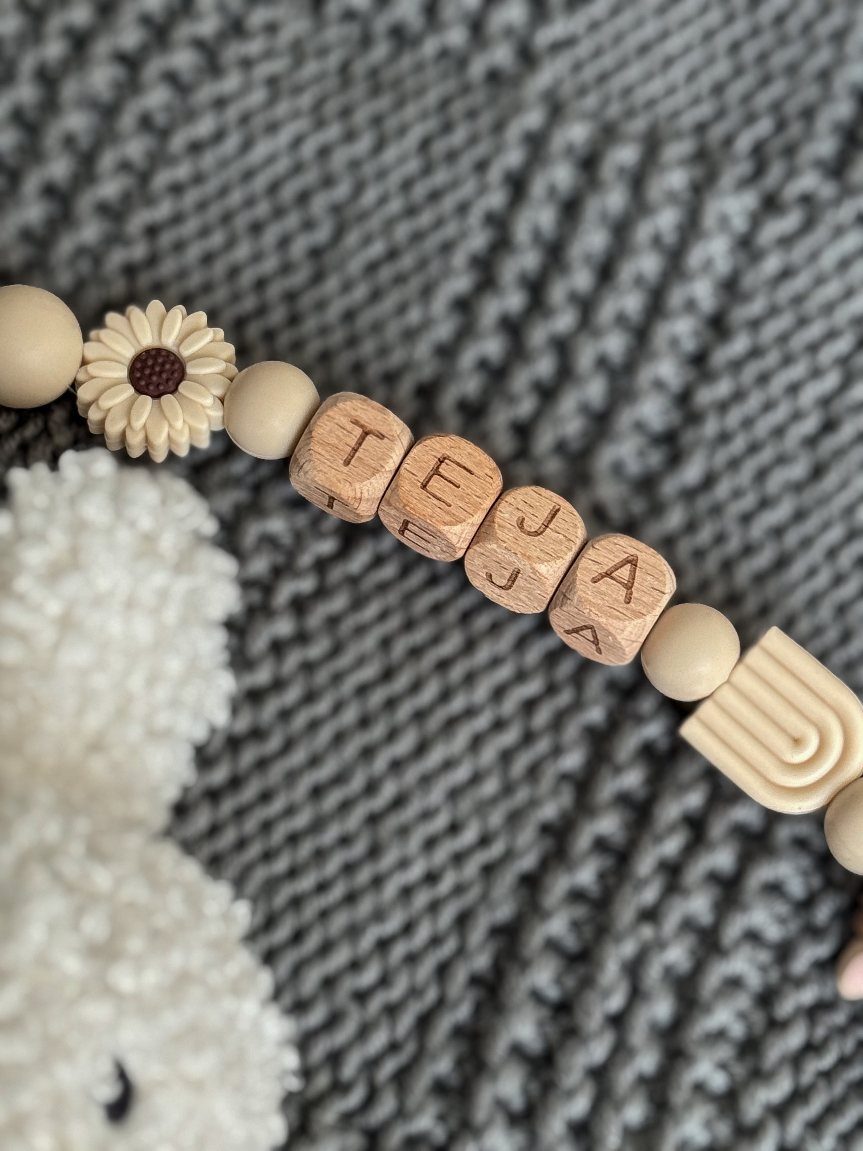 Čiulptuko laikiklis su vardu