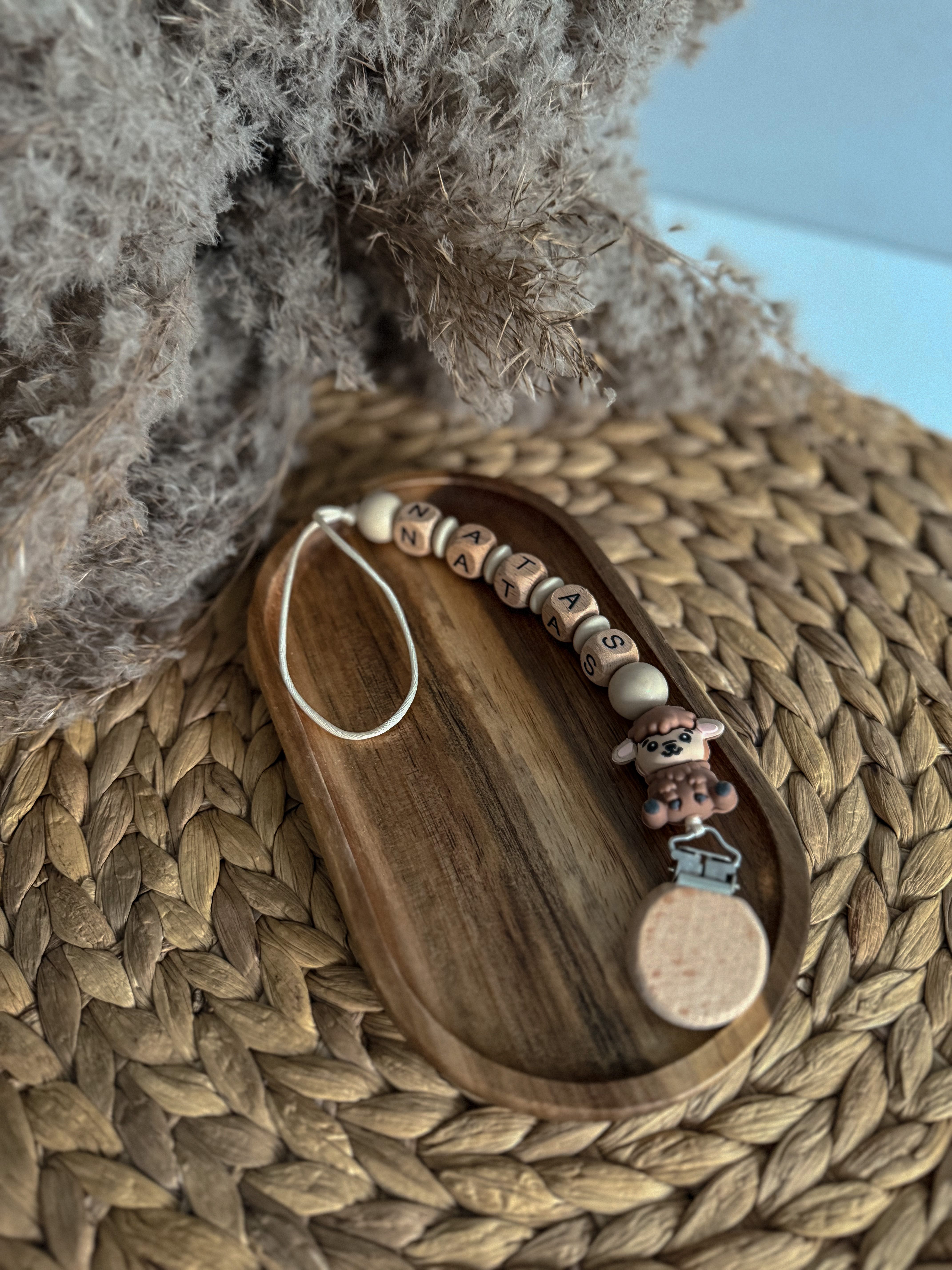 Čiulptuko laikiklis su vardu