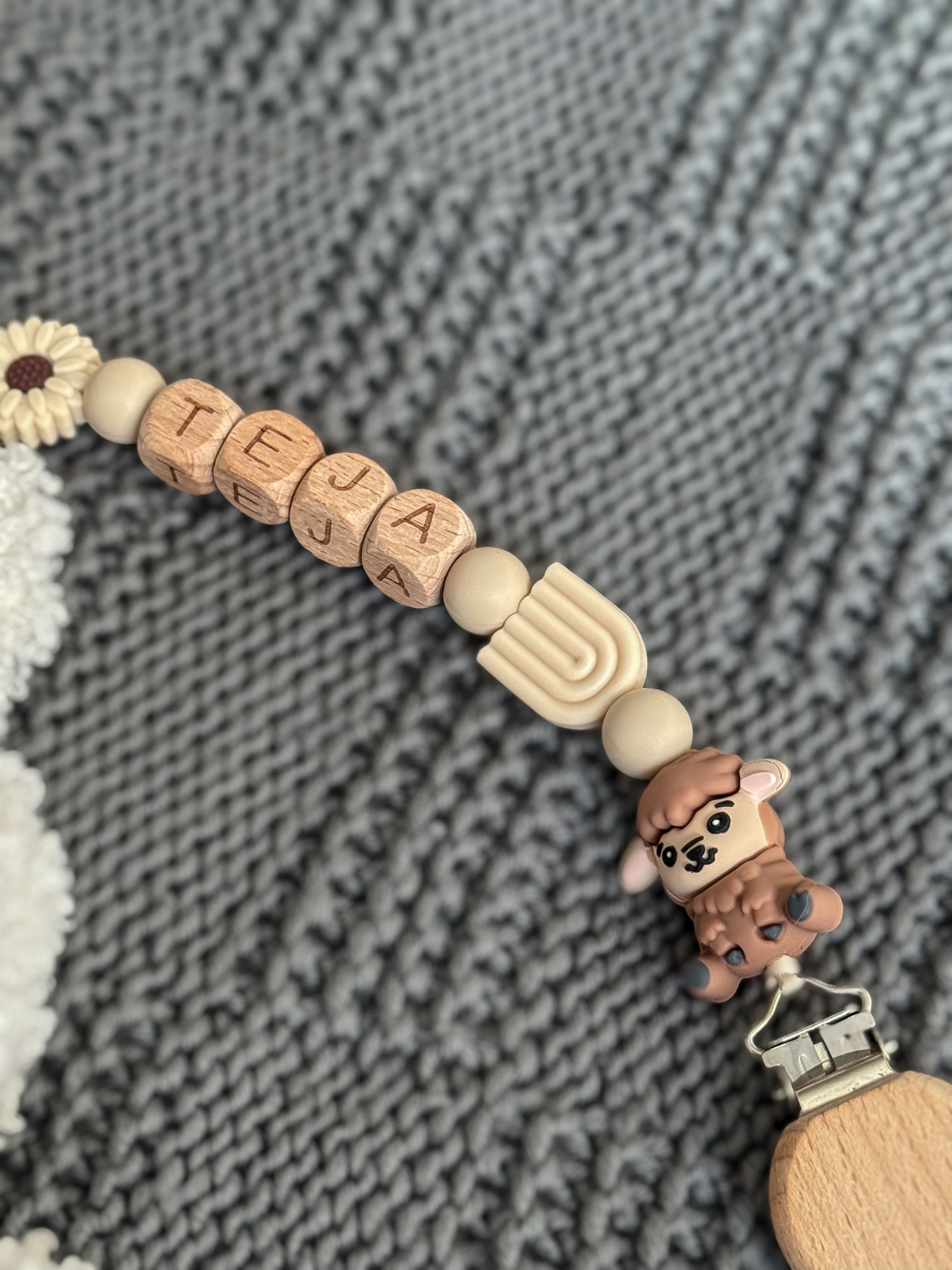 Čiulptuko laikiklis su vardu