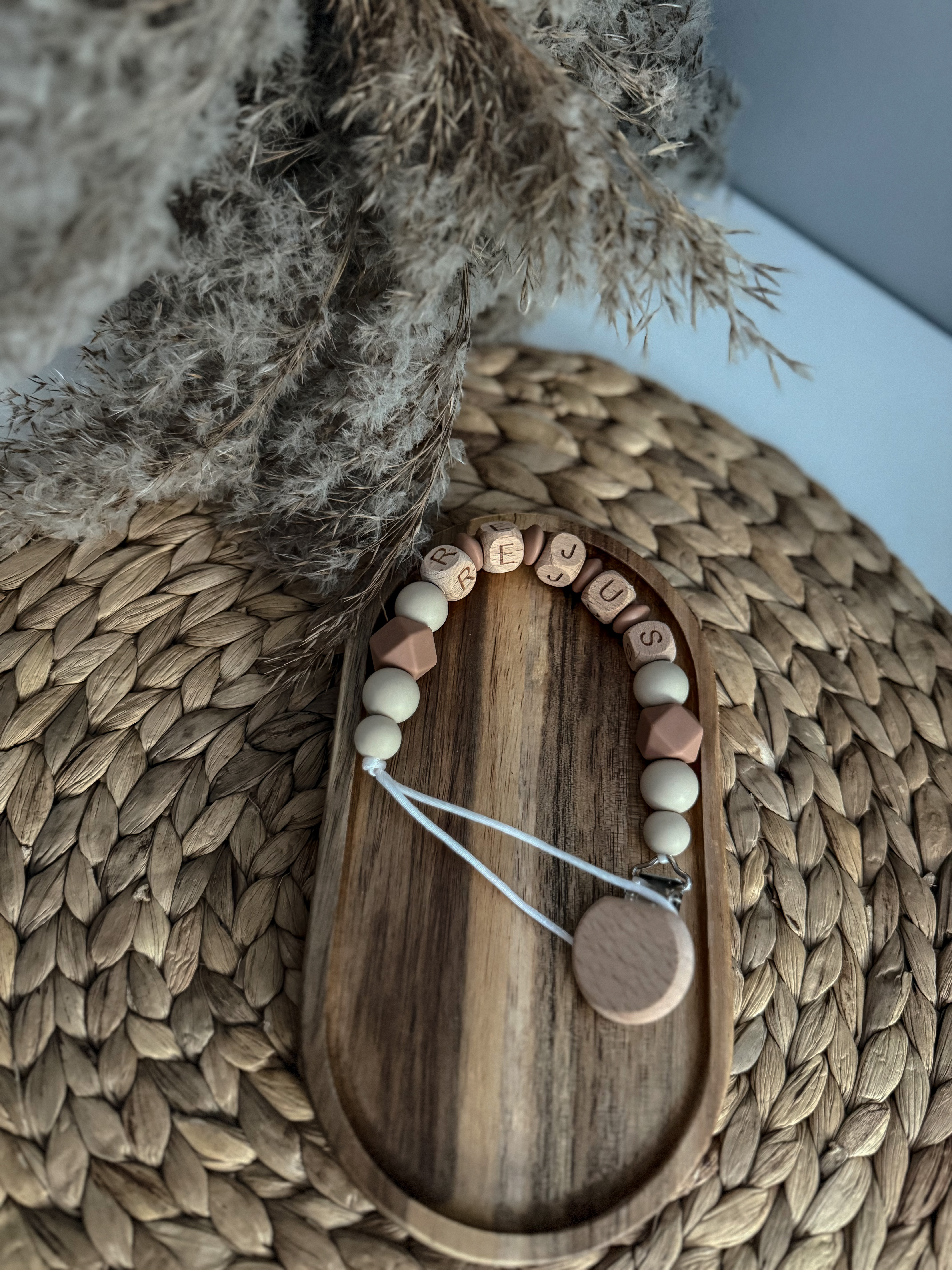 Čiulptuko laikiklis su vardu