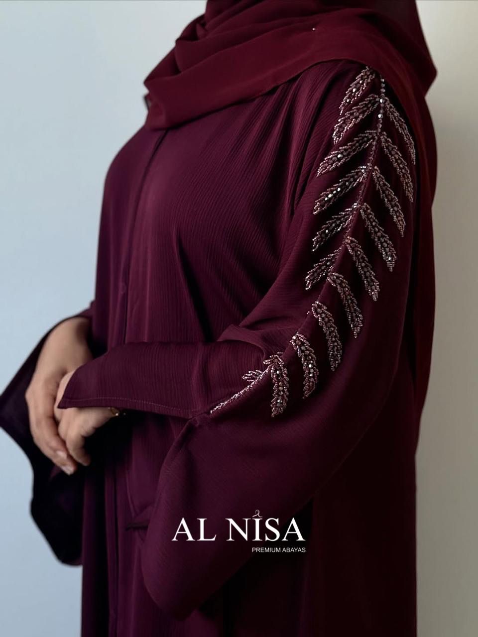 Unique Abaya with hand-beaded sleeves