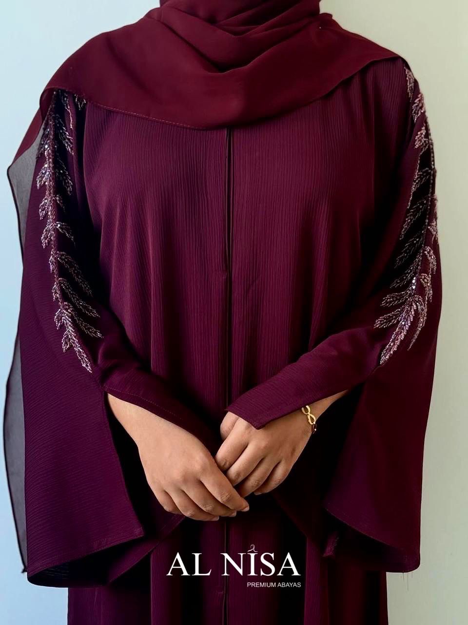 Unique Abaya with hand-beaded sleeves