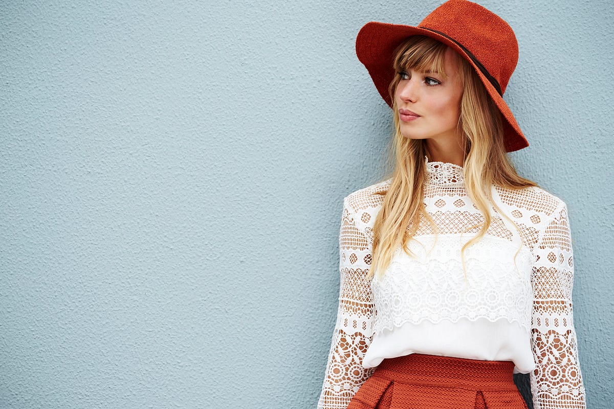 Elegant Lace Blouse with Rust Skirt