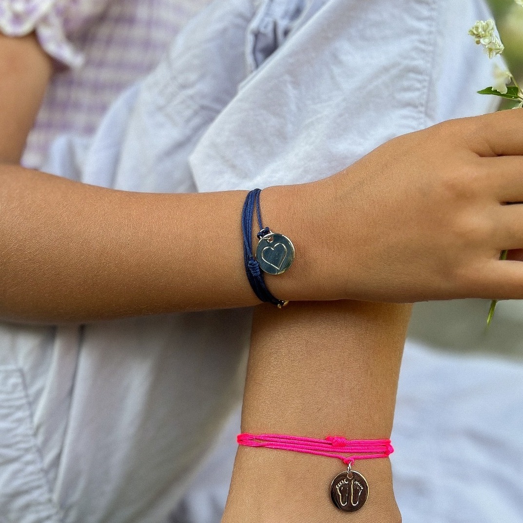 MÉDAILLE SYMBOLE DORÉ PIEDS