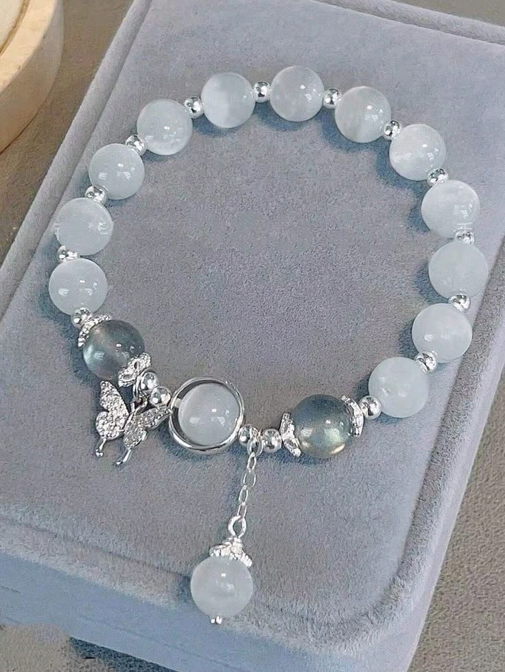 Elegant Beaded Bracelet with Fairy Charm