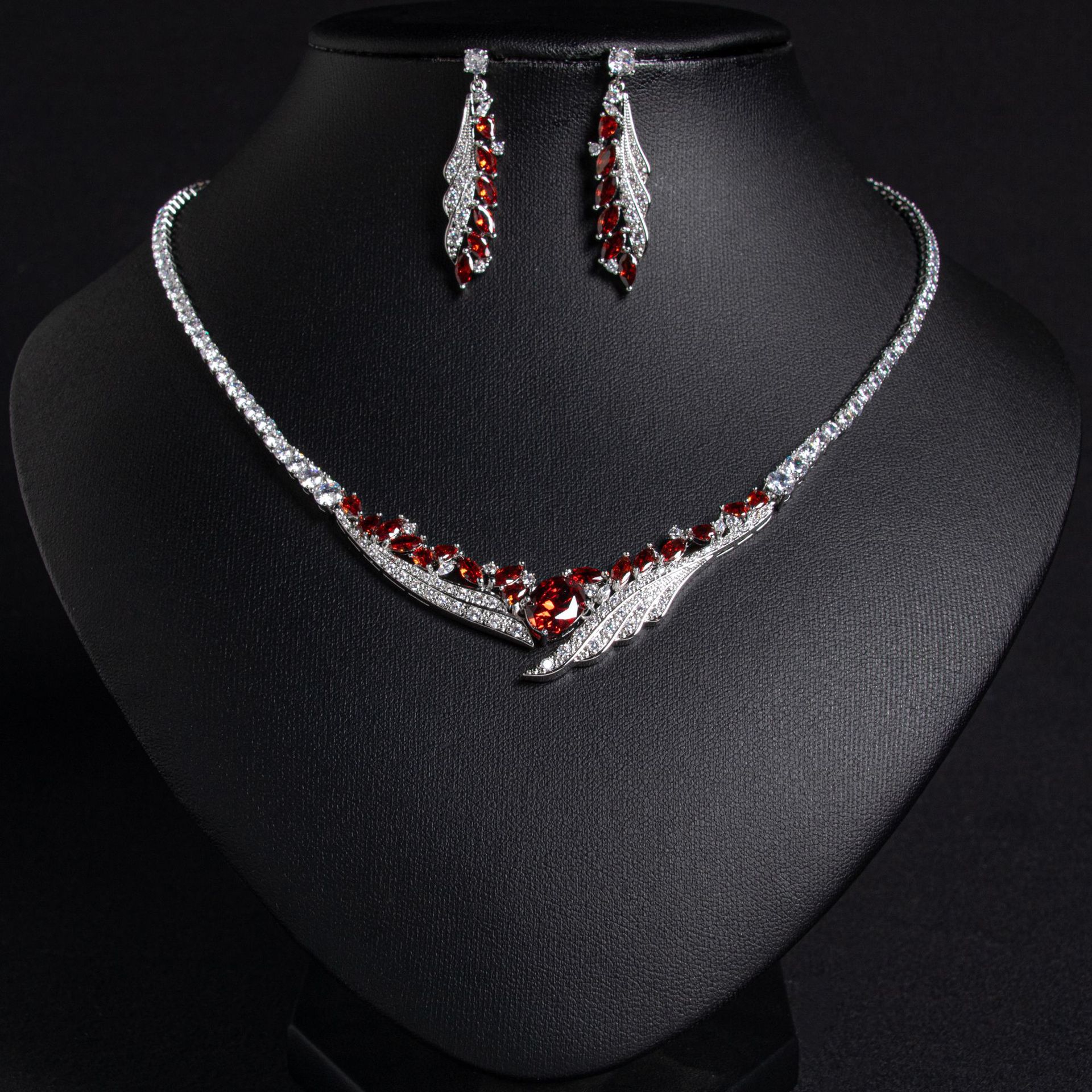 Elegant Silver Jewelry Set with Red Gemstones