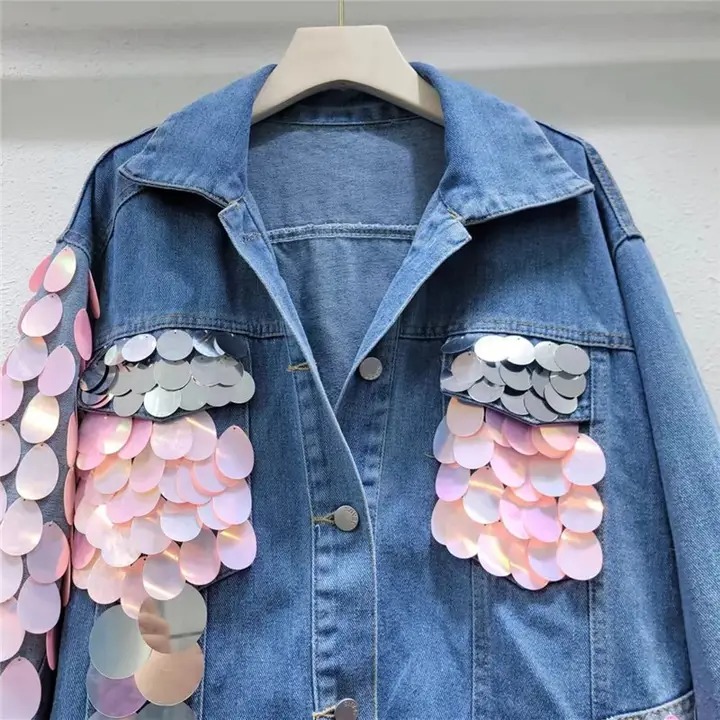 Denim jacket with pink appliqués