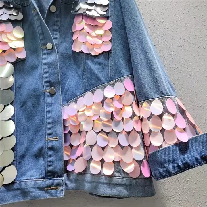 Denim jacket with pink appliqués
