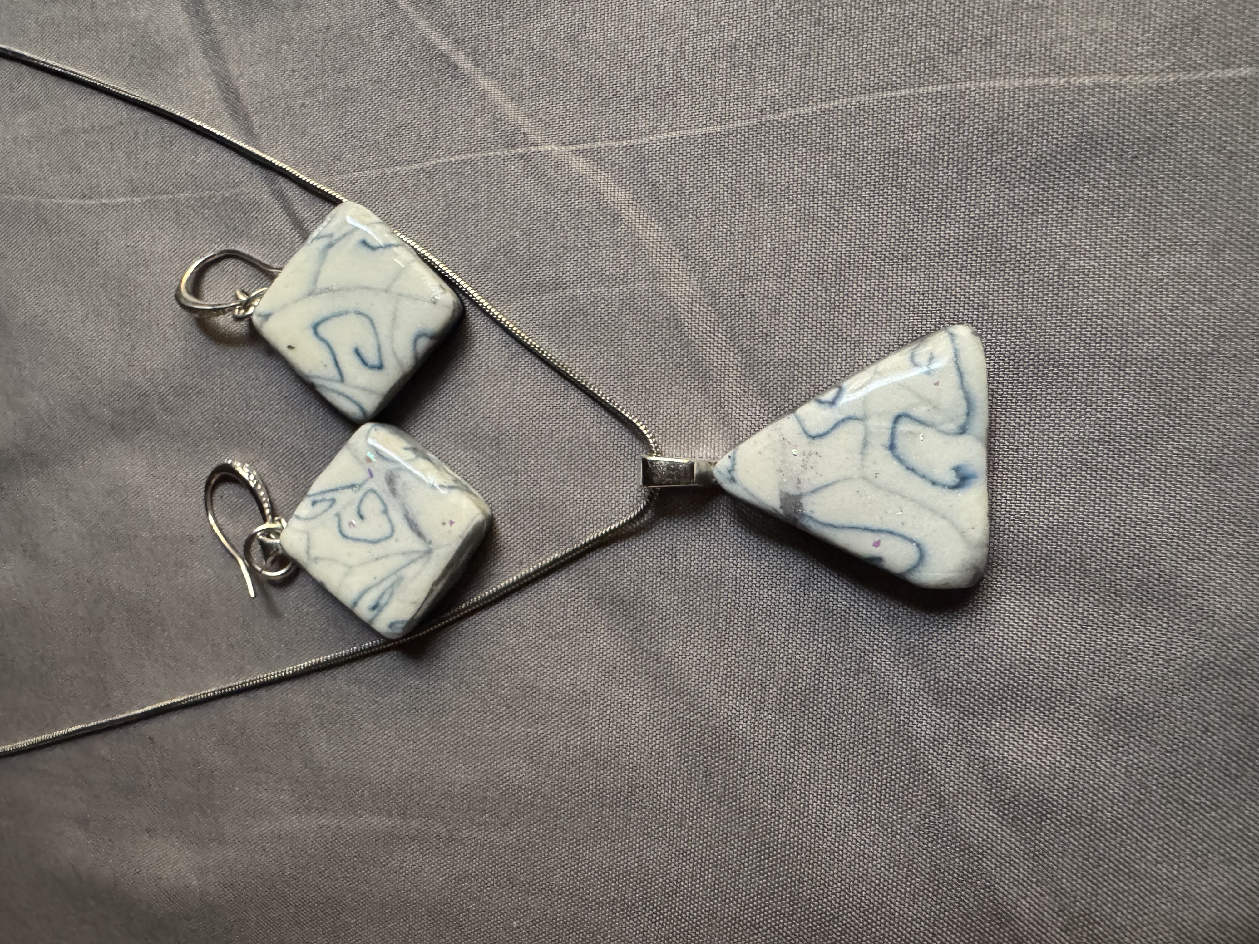Blue Swirl Pendant Necklace and Decorative Silver Hoop Earrings Set