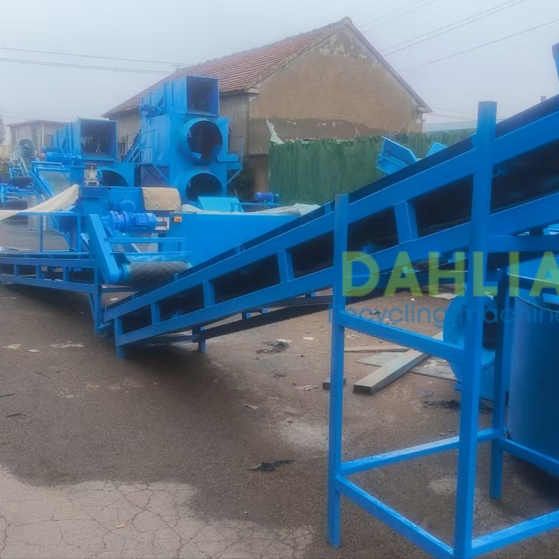 High capacity hard cover book spine cutting system for recycling center