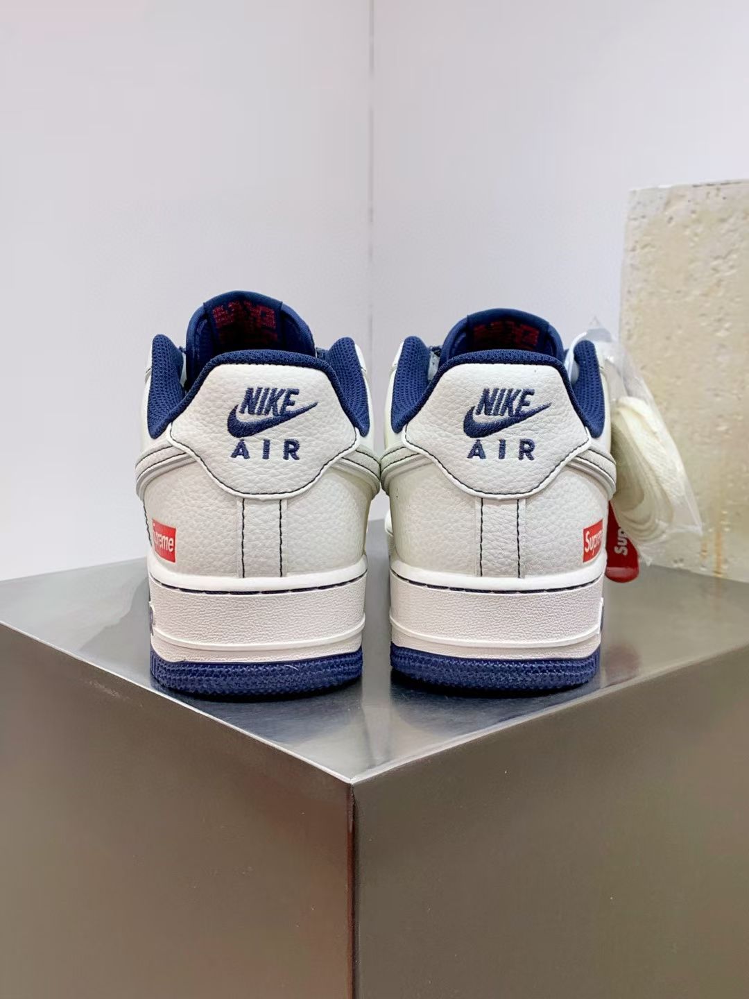 Nike Air Force 1 Supreme White Sneakers