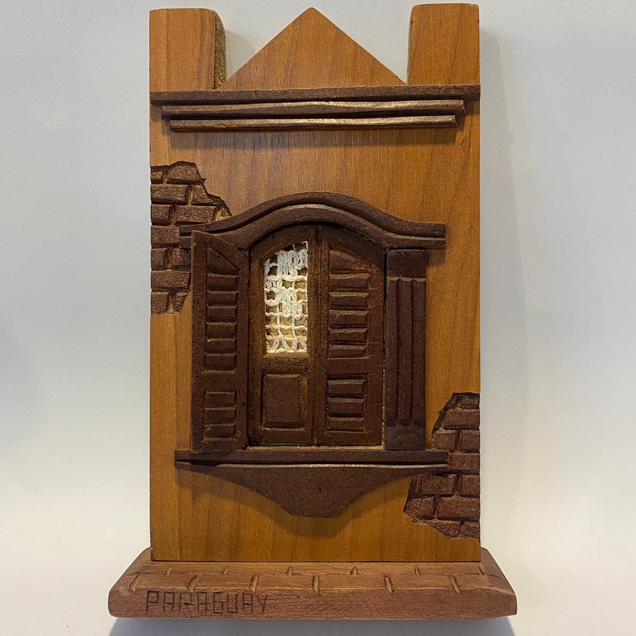 Fachada Colonial artesanal de madera